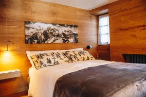 Postel nebo postele na pokoji v ubytování Maison Brenva Elegant A