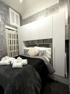 Postel nebo postele na pokoji v ubytování Nest In Florence 27