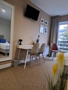 TV a/nebo společenská místnost v ubytování Ohouse aparts