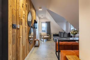 TV a/nebo společenská místnost v ubytování Apart-Invest Gimnazjalna 9