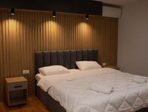 Ένα ή περισσότερα κρεβάτια σε δωμάτιο στο Hotel Cingo