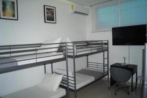 Postel nebo postele na pokoji v ubytování City Caribbean Hotel Boutique