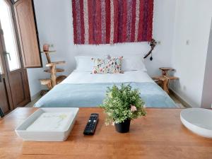 A bed or beds in a room at Centro de Arte