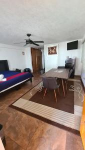 Postel nebo postele na pokoji v ubytování Hotel Leyenda del Tepozteco