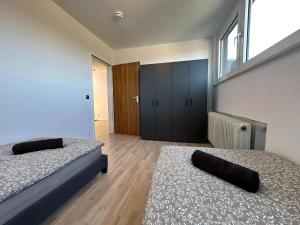 Ένα ή περισσότερα κρεβάτια σε δωμάτιο στο H&S Host & Sleep Emsdetten Groß & Ruhig