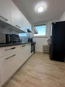 Η κουζίνα ή μικρή κουζίνα στο H&S Host & Sleep Emsdetten Groß & Ruhig