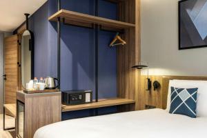 Postel nebo postele na pokoji v ubytování Four Points Flex by Sheraton Ankara Cukurambar