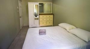 Ένα ή περισσότερα κρεβάτια σε δωμάτιο στο Chic Getaway 1