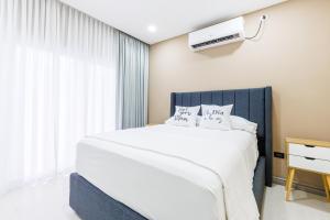 Postelja oz. postelje v sobi nastanitve Habitación-Exclusiva-Cómoda-Centrica