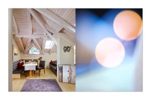 a living room and a dining room with a ceiling at Apart Montanara in Ischgl