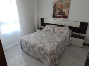 Postel nebo postele na pokoji v ubytování VUT "O Pazo" Sanxenxo os espera