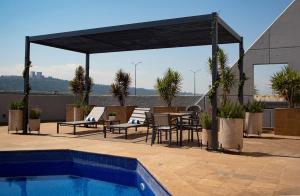 Bazén v ubytování Hotel Turotel Morelia nebo v jeho okolí