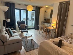 Χώρος καθιστικού στο Apartment am Hochseilgarten