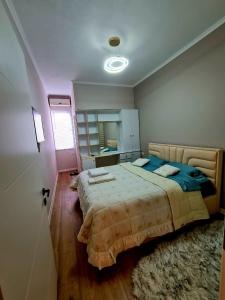 Postel nebo postele na pokoji v ubytování DION Apartment