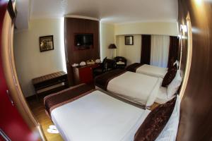 Postel nebo postele na pokoji v ubytování Tolip Inn Maadi + 25 fotografií