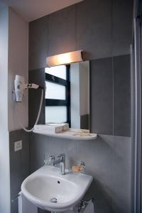 Koupelna v ubytování Hotel Ceresio