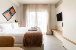 Ένα ή περισσότερα κρεβάτια σε δωμάτιο στο BHomy Soares +30 φωτογραφίες