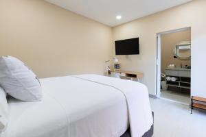Postelja oz. postelje v sobi nastanitve Habitación-Exclusiva-Cómoda-Centrica