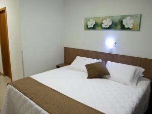 Postel nebo postele na pokoji v ubytování Al Mare Hotel