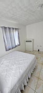 Postel nebo postele na pokoji v ubytování Serenity Corner