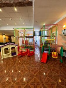 a childrens play room with many different play equipment at Departamentos Anthony in Santa Teresita +6 photos