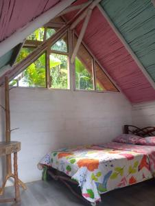 Postel nebo postele na pokoji v ubytování Eco Hotel Manu Viajeros
