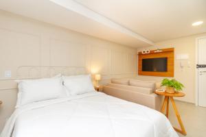 Postel nebo postele na pokoji v ubytování 360 Sanfran Riachuelo + 84 fotografií