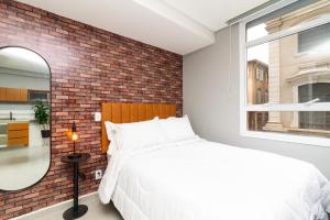 Postel nebo postele na pokoji v ubytování 360 Sanfran Riachuelo