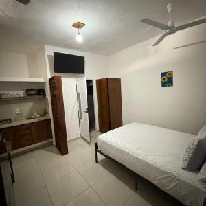 Ένα ή περισσότερα κρεβάτια σε δωμάτιο στο Bungalows La Condesa