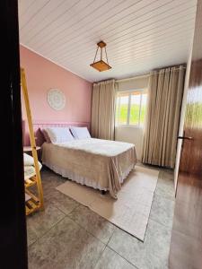 Giường trong phòng chung tại Pousada Ecológica Rancho do Sena