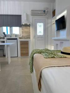 Kuchyň nebo kuchyňský kout v ubytování Marina's Cozy Studio