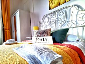 Posteľ alebo postele v izbe v ubytovaní B&B Perla