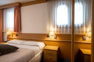 Posteľ alebo postele v izbe v ubytovaní Hotel Al Polo
