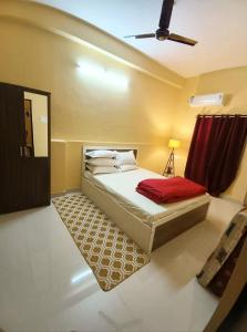 Postel nebo postele na pokoji v ubytování Bliss Homestay