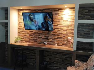 TV a/nebo společenská místnost v ubytování HOTEL BAEZA