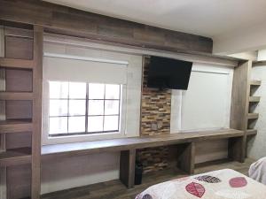 Postel nebo postele na pokoji v ubytování HOTEL BAEZA