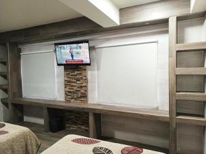TV a/nebo společenská místnost v ubytování HOTEL BAEZA