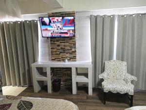 TV a/nebo společenská místnost v ubytování HOTEL BAEZA