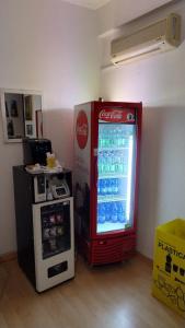 A kitchen or kitchenette at Hotel Perla