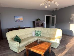 a living room with a white couch and a coffee table at Villa Black Sea in Balchik +76 photos