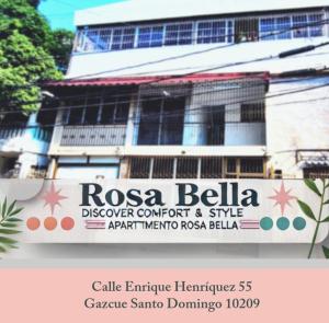 a building with a sign in front of it at Departamento Sol in Santo Domingo