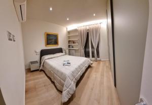 Ένα ή περισσότερα κρεβάτια σε δωμάτιο στο Domus de Core