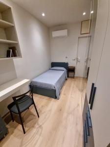 Ένα ή περισσότερα κρεβάτια σε δωμάτιο στο Domus de Core