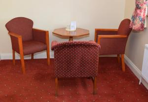 Posezení v ubytování Rhu Glenn Hotel