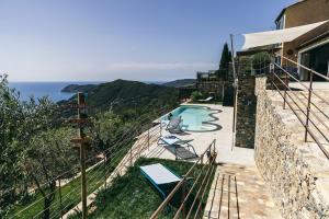 a villa with a view of the ocean at BLUVARI' Charming House in Alassio