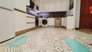 Kuchyň nebo kuchyňský kout v ubytování Alma Canaria Rooms