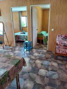 Postel nebo postele na pokoji v ubytování Ohotu-Rangiroa house