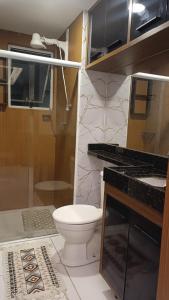 Koupelna v ubytování Apto com ar, lazer, conforto e portaria 24h ideal para famílias!