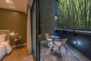 Voodi või voodid majutusasutuse El Tesoro Medellín Hab315 by Letoh toas