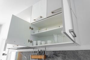 Kuchyňa alebo kuchynka v ubytovaní Castle Cozy Apartment